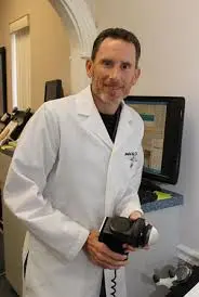 Dr. Lewis M. Clark, M.D.